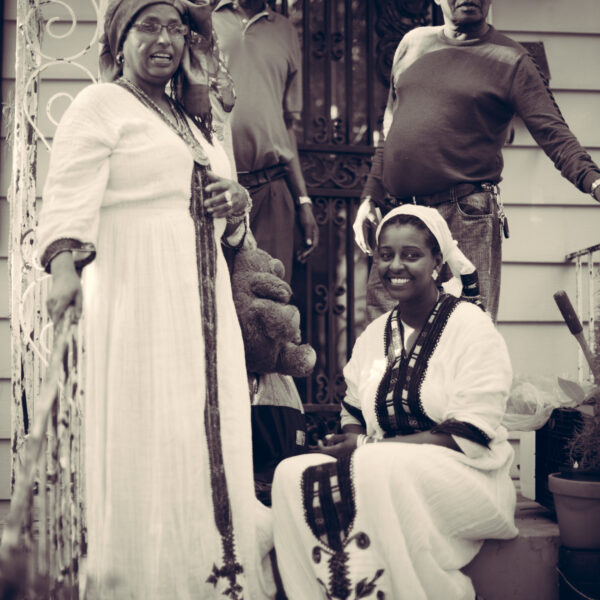 casual family portrait on doorstep